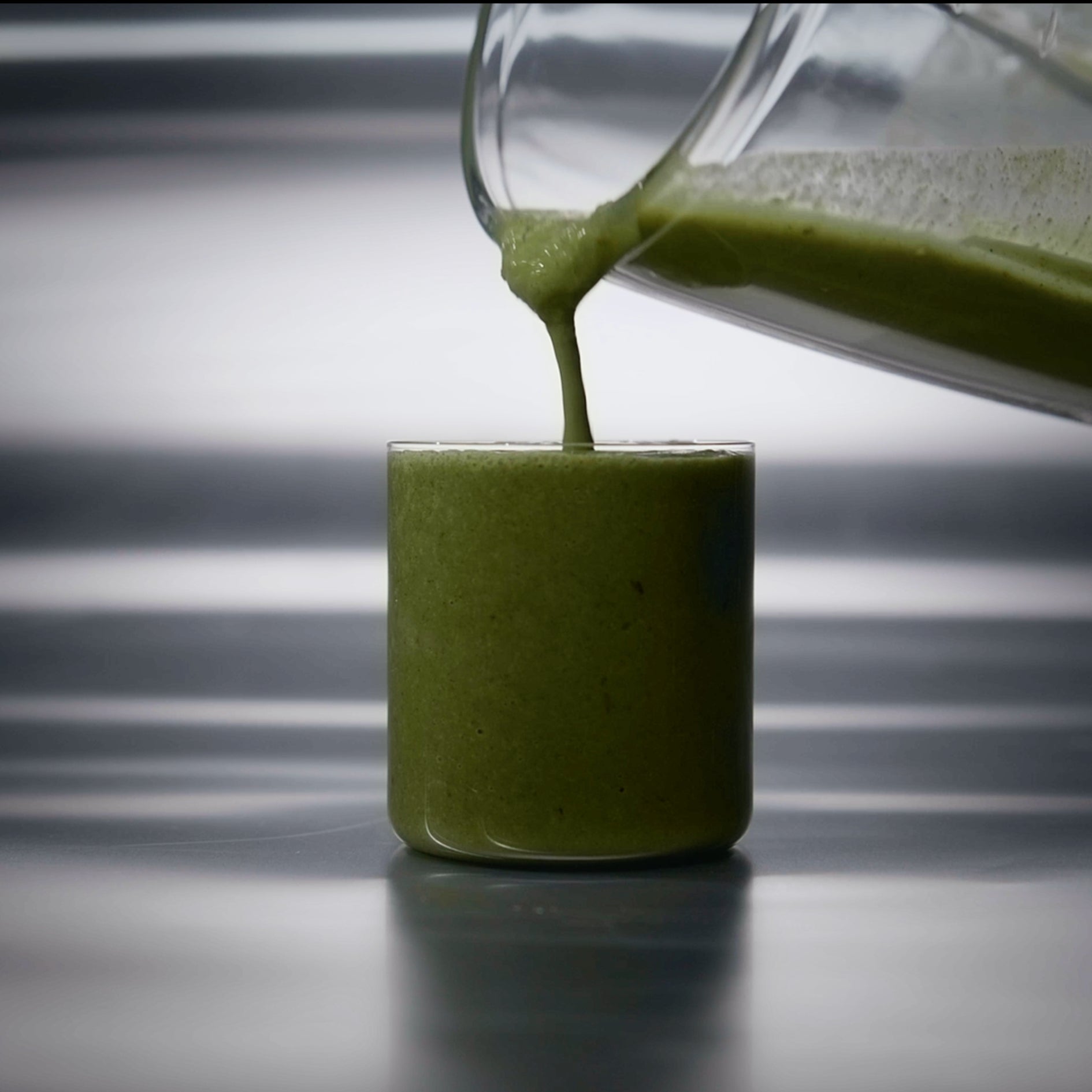 Ashitaba Smoothie Glass being filled with Ashitaba Smoothie